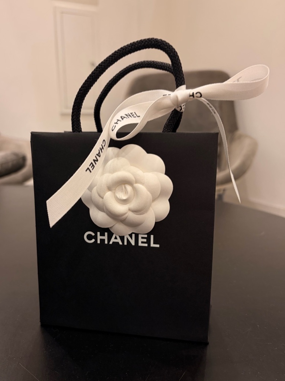 CHANEL Black Gift Bag with White Camellia and Ribbon